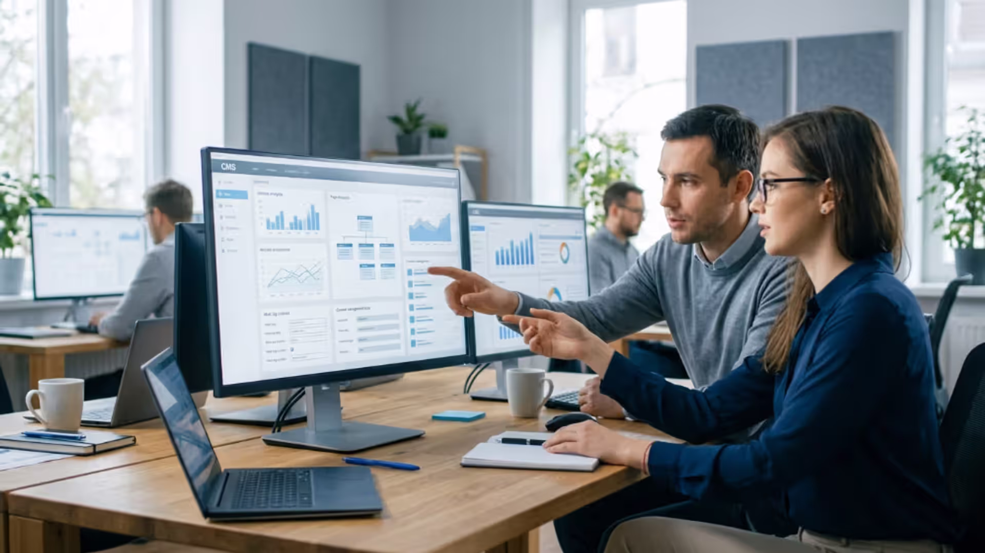 SEO specialists managing website optimization through a CMS dashboard